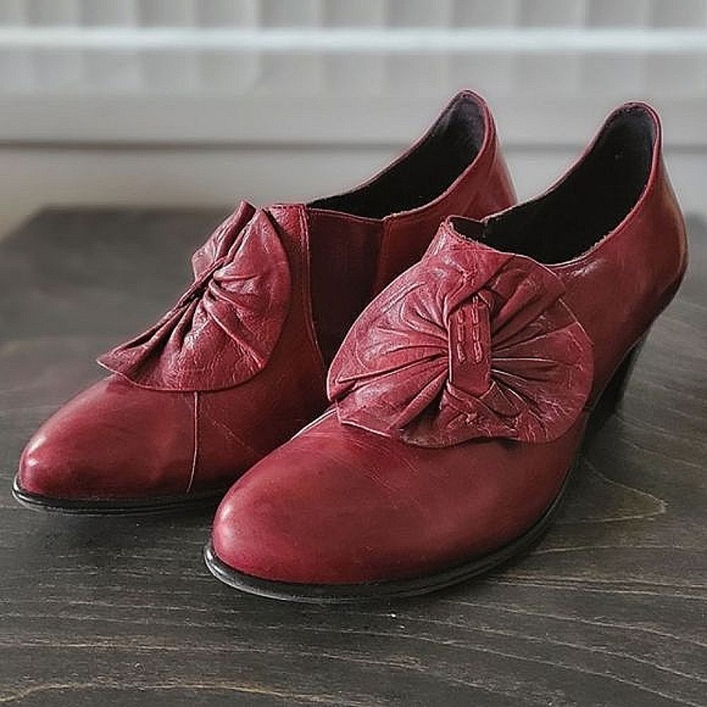 Vtg wine leather cone heel bow pumps